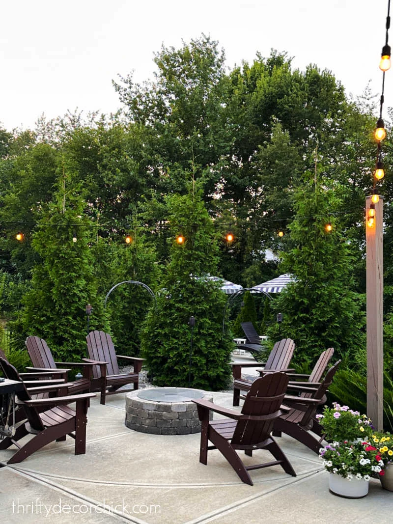 round patio fire pit with chairs